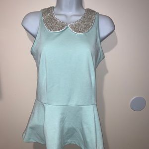 Woman’s Sleeveless Top with Embellished Collar